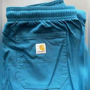 Carhartt scrub jogger bottoms in Caribbean blue.